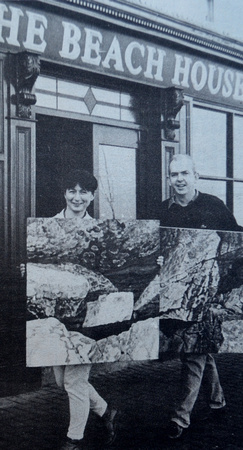 Denis Byrne helps artist Rachel Kerr with her Coopers exhibition 1994 Bray People July To December