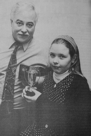 Greystones Swimming Club's Fran McNabb presents Vicky Corrigan with her Endeavor Cup 1995 Bray People