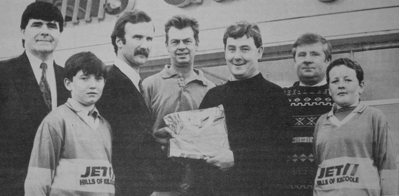 Hills Garage present Pat Fortune with Kilcoole GAA Club jerseys whilst Tom Fortune, Vincent Quigley, Derek Smith, Tony Bradshaw & Tom Murphy look on 1995 Bray People