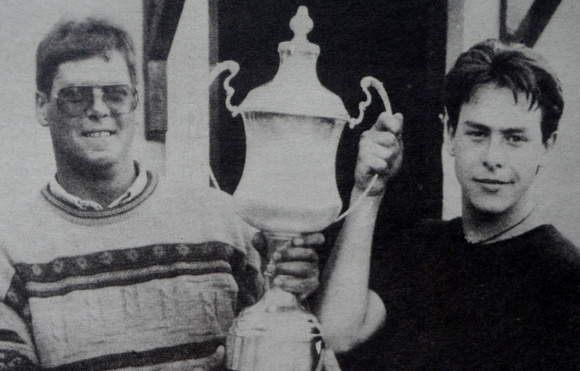 The Harbour Bar's Paul O'Toole Jnr presents Bray Head Fishing winner Stephen Phillips with his trophy 1995 Bray People