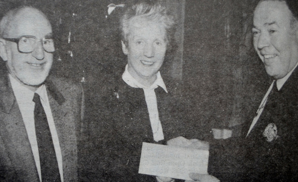 La Touche Hotel's Niall Kenny presents GCS's John Ryan & Kay McGrath with €1,000 1995 Bray People