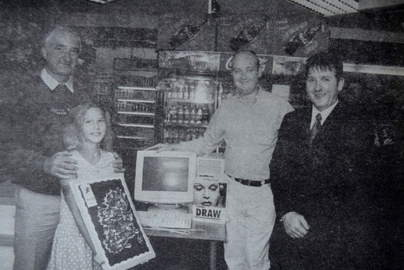 Young Katie Stack wins another colour competition, with dad, Justin and Centra's David Whelan & Raymond Foley 1999 Bray People