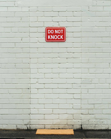 doors unfriendly do not knock builder wall