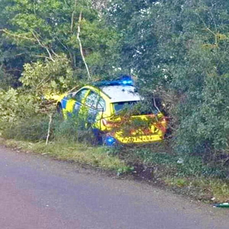 garda car crash accident hedge