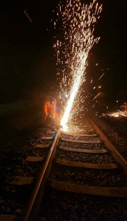 trains railway irish rail works tracks sparks welding dart