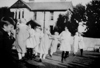 Dancing-outside-Eyrefield-House-Church-Road-1920-including-the-Scott-ladies-and-Jane-Evans.-Srouce-Derek-Paine-1024x695